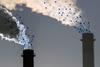 Chimney stacks with plastic bottles illustrated in the rising smoke