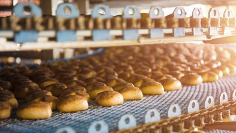 Cakes on automatic conveyor belt