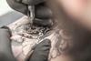 Tattoo being drawn