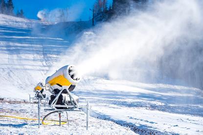 Snow blowing machine