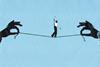 Man walking on tightrope