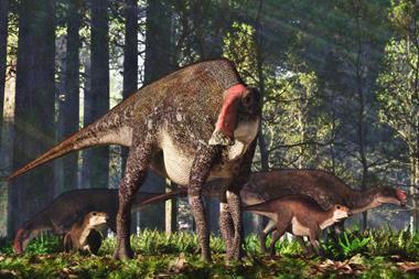 A group of adult and young dinosaurs in a forest