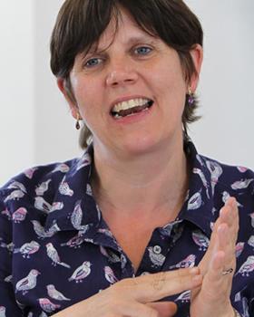 Portrait of teaching fellow Audrey Cameron, who specialises in understanding science through sign language – based at University of Edinburgh