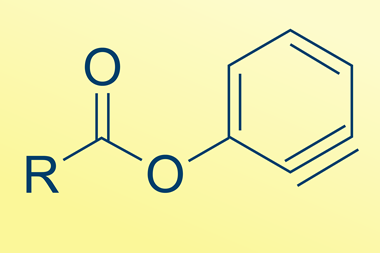 A chemical structure of a carbon with an R Group a double bonded oxgygen and a single bonded oxygen attached to an aromatic ring which contains a triple bond